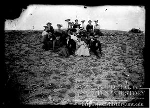 Primary view of object titled '[group of people on slope of hill]'.