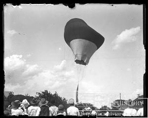 Primary view of object titled '[Crowd Looking at Balloon]'.