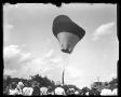 Thumbnail image of item number 1 in: '[Crowd Looking at Balloon]'.
