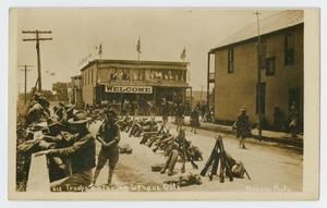Primary view of object titled '[Postcard of Troops Entering League City]'.