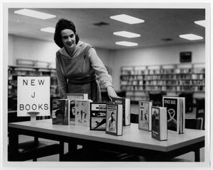 [Librarian Showing Off a Book Display]