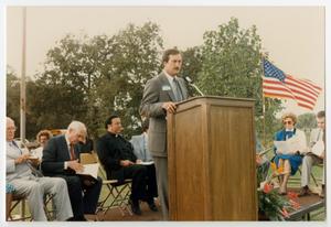 Primary view of object titled '[Speaker at the Walter Hall Park Dedication]'.