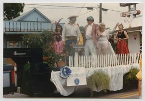 Primary view of object titled '[Costumed People on a Parade Float]'.