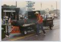 Thumbnail image of item number 1 in: '[Barbecue Trailer in a League City Parade]'.