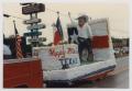 Photograph: [Giant Texan on a Parade Float]