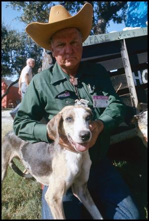Primary view of object titled '[Virge T. Williams with Hog Dog]'.