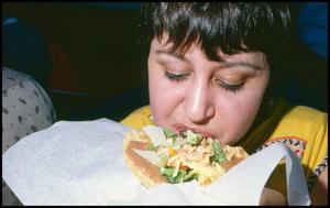 [Woman Eating a Chalupa]