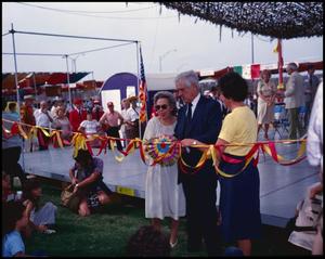 [John B. Connally and Wife Nellie Connally Cutting a Ceremonial Ribbon]