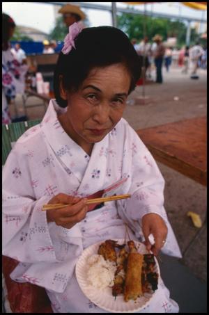 [Japanese Woman with a Plate of Food]
