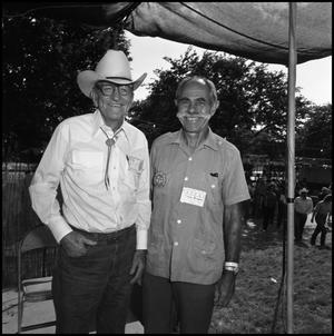 [Photograph of Joe Newton and Roger Sackett]