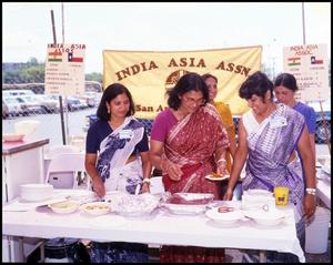 [Food Preparation at the India-Asia Association Booth]