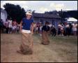 Primary view of [Children Competing in Sack Race]