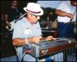 Photograph: [Jussie Stutes Playing the Pedal Steel Guitar]