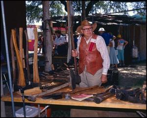 [Arnold Griffin with Antique Tools]
