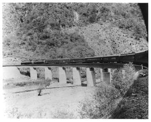Primary view of object titled '[Chihuahua - Pacific Railway train on Santa Barbara Bridge]'.