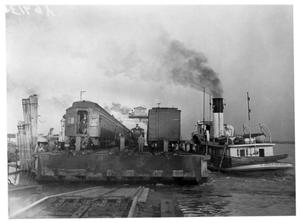 Primary view of object titled '[Ferry Barge and Passenger Train in New Orleans]'.