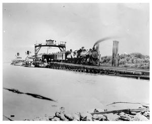 [Ferry Barge and Passenger Train in New Orleans]