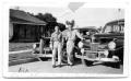 Photograph: Leon K Lineman and Buddy Sinclair with cars