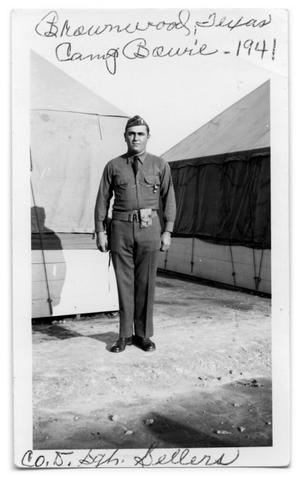 Sgt. Seller outside tent Camp Bowie 1941