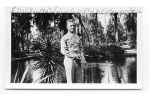 Primary view of object titled '"Buddy" standing next to pond Orlando 1942'.