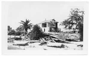 Primary view of object titled '[Photograph of Seaside Hotel and Debris]'.