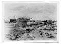 Photograph: [Photograph of Simpson and Miller Homes After Hurricane]