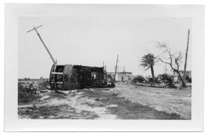 [Photograph of Streetcar Overturned in Road]