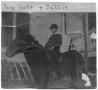 Primary view of [Thomas McGee Scott on his horse Sallie]