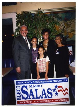 [Salas Family Indoors with Election Sign]