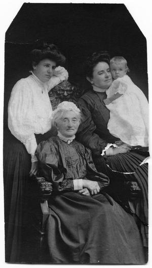 Primary view of object titled '[Elizabeth DeBarger McGuire with family]'.