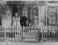 Photograph: Delia Woolf and Her Family Members on Their Porch
