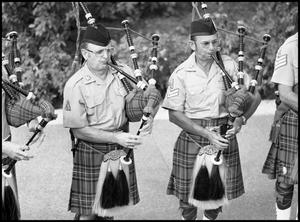 [Bagpipers of the Alamo City Highlanders Performing]