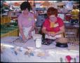Photograph: [Dixie Deike and Liz Deike Making Coon Oil Cookies]