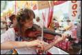 Thumbnail image of item number 1 in: '[Fiddler at Polish Booth]'.