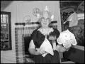 Primary view of [Marie Fleming Displaying Dutch Hats]