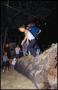 Primary view of [Children Jumping Off Large Tree Trunk in Frontier Playland]