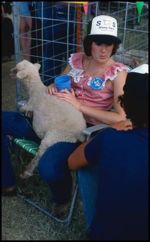 [Woman With Lamb in Her Lap]