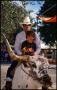 Photograph: [Gary Henry and Child Riding Bubba the Longhorn]