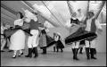 Photograph: [Hungarian Dancers Performing in Pairs]