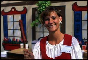 [Woman Serving German Sausage]