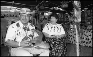 [Eliseo and Nieves Torres at Mexican Folk Medicine and Folk Beliefs Booth]