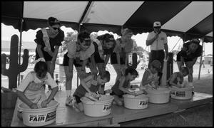 Primary view of object titled '[Corn Shucking Contest]'.