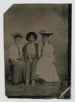 [Portrait of Two Women and a Man]