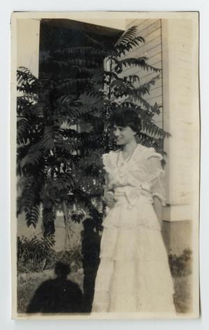 Primary view of object titled '[Nannie Evans Standing Outdoors]'.