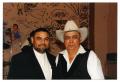 Thumbnail image of item number 1 in: '[Johnny Degollado Standing Next to Another Man]'.