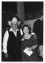 Photograph: [A Woman Standing With Johnny Degollado]