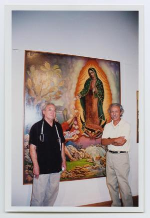 [Two Men Standing in Front of a Painting]