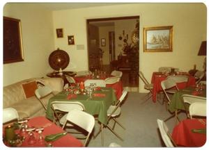Primary view of object titled '[Tables and Chairs Readied for Christmas Party]'.