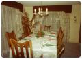 Primary view of [Christmas Place Setting on Long Table]