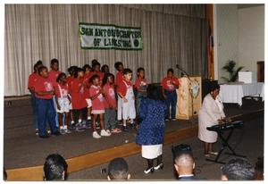 [Boys and Girls Performing at Martin Luther King Middle School]